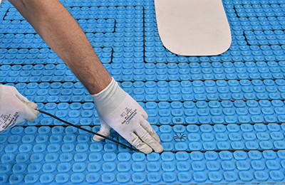 Prodeso membrane with ComfortTile cable during installation